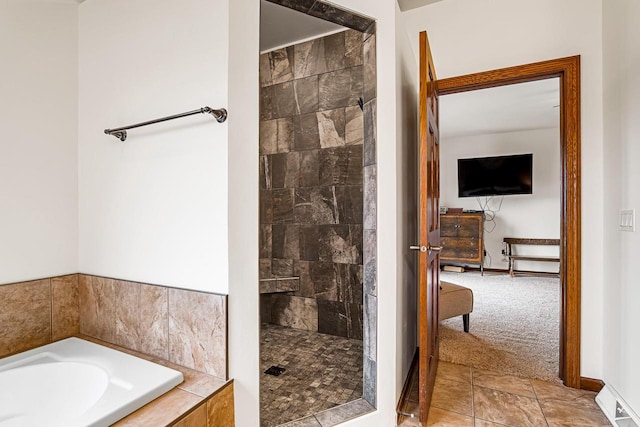 full bath with a bath and a tile shower
