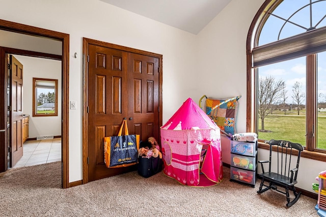 rec room featuring a wealth of natural light, carpet flooring, baseboards, and visible vents