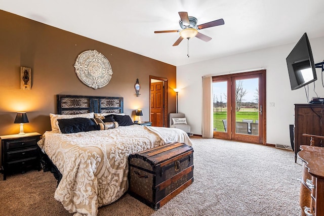 bedroom featuring carpet, a ceiling fan, visible vents, and access to outside