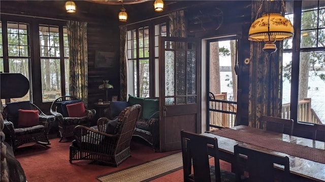 6051 Elsie Rd, Stone Lake, WI 54876 - living area featuring plenty of natural light and carpet flooring