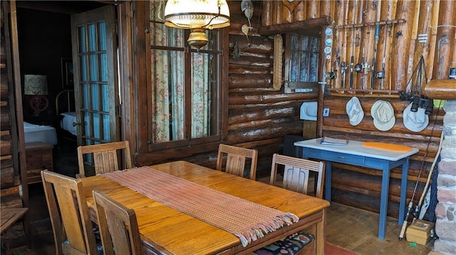 6051 Elsie Rd, Stone Lake, WI 54876 - dining area featuring rustic walls