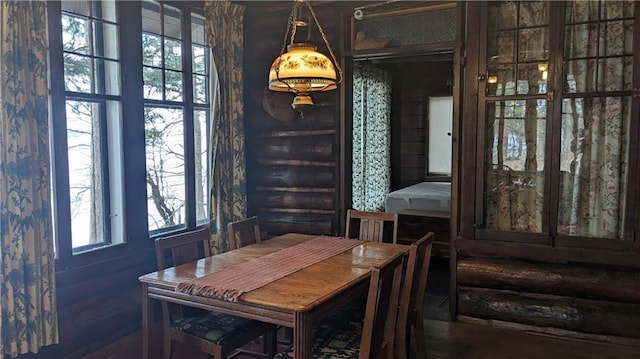 6051 Elsie Rd, Stone Lake, WI 54876 - dining space with log walls