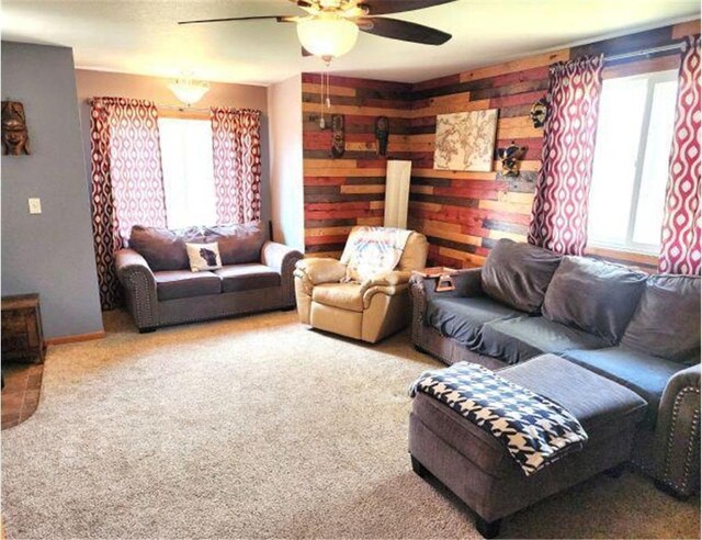 21 N Main St, Luck, WI 54853 - living area with ceiling fan, carpet floors, and baseboards