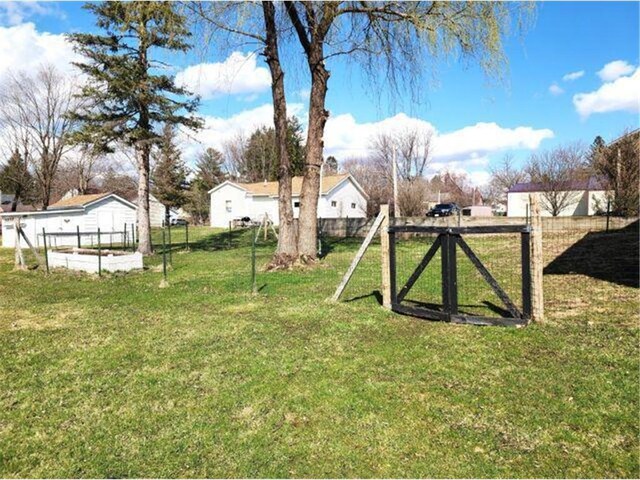 21 N Main St, Luck, WI 54853 - view of yard featuring fence