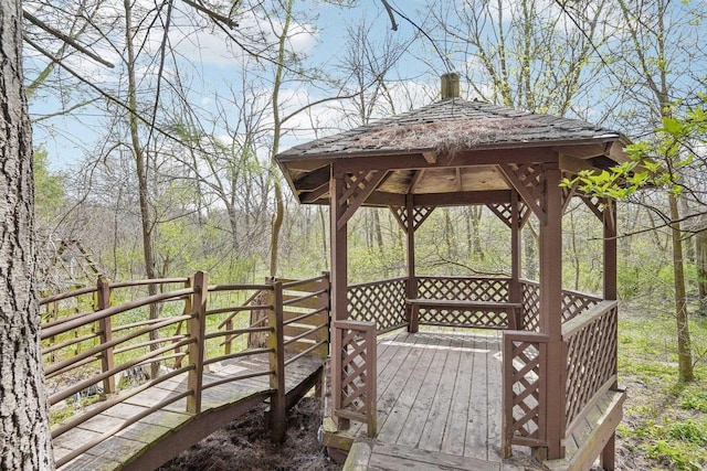 wooden deck featuring a gazebo