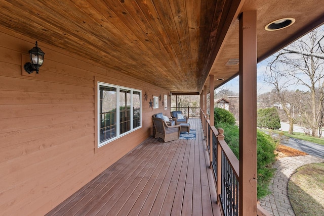 deck featuring covered porch