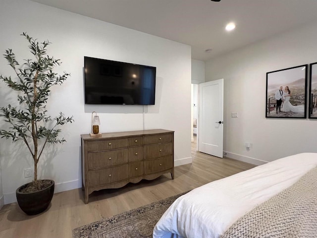 3156 Breeze Dr, Sun Prairie, WI 53590 - bedroom with baseboards, recessed lighting, and light wood-style floors