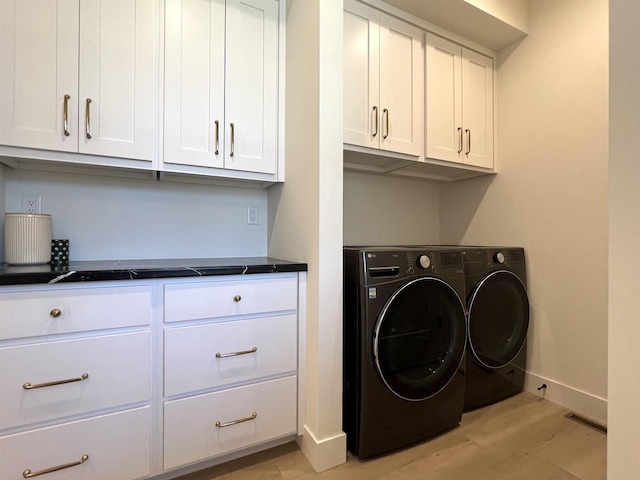 3156 Breeze Dr, Sun Prairie, WI 53590 - laundry room with cabinet space, independent washer and dryer, visible vents, and baseboards
