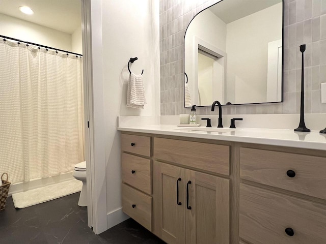 3156 Breeze Dr, Sun Prairie, WI 53590 - full bath with vanity, marble finish floor, baseboards, toilet, and recessed lighting