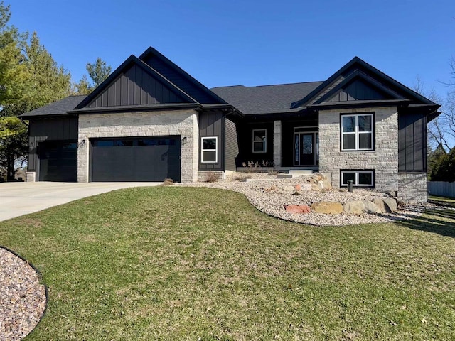 3156 Breeze Dr, Sun Prairie, WI 53590 - craftsman inspired home featuring an attached garage, stone siding, board and batten siding, and a front yard