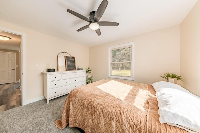 W2252 Spring Lake Rd, Markesan, WI 53946 - carpeted bedroom featuring baseboards and ceiling fan