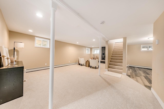W2252 Spring Lake Rd, Markesan, WI 53946 - below grade area featuring baseboard heating, stairs, carpet floors, baseboards, and recessed lighting