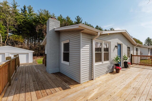 W2252 Spring Lake Rd, Markesan, WI 53946 - deck featuring an outbuilding and a garage