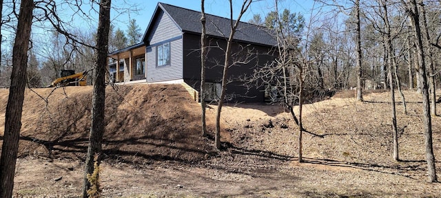 365 13th Dr, Nekoosa, WI 54457 - view of side of property with roof with shingles