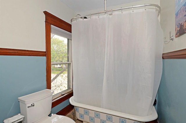 301 Van Buren St, Sauk City, WI 53583 - bathroom featuring toilet and shower / bath combo with shower curtain