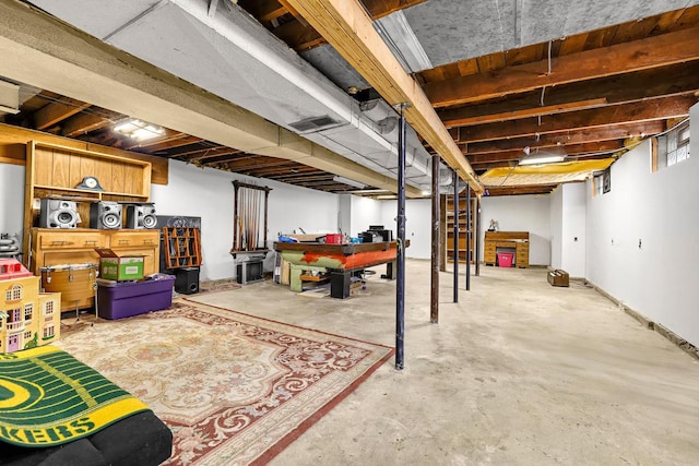 unfinished basement featuring visible vents