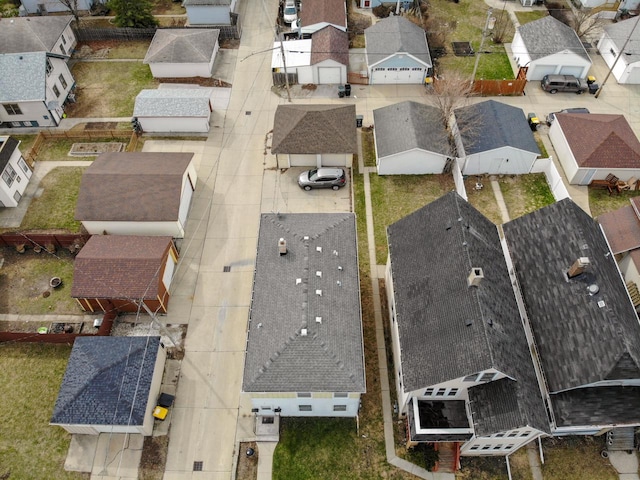 birds eye view of property with a residential view