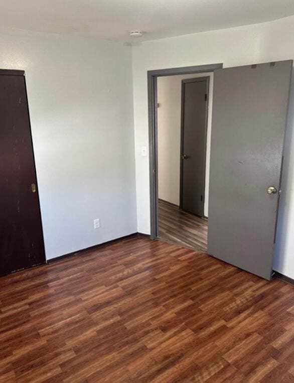 unfurnished room featuring wood finished floors