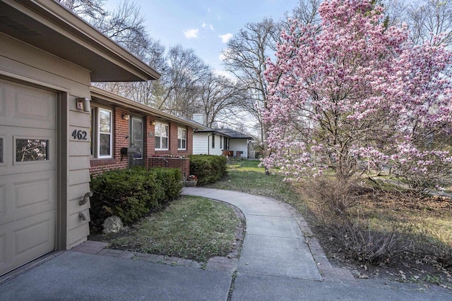 view of yard with a garage