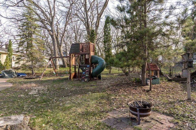 view of jungle gym featuring fence