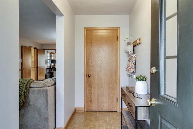 entrance foyer featuring baseboards