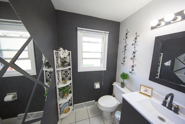2607 King James Way, Fitchburg, WI 53719 - half bathroom featuring toilet, vanity, tile patterned floors, and visible vents
