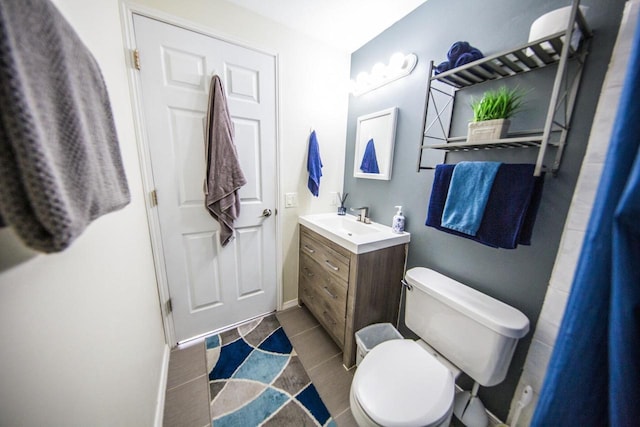 2607 King James Way, Fitchburg, WI 53719 - bathroom featuring baseboards, vanity, and toilet