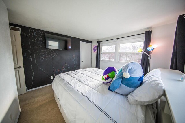 2607 King James Way, Fitchburg, WI 53719 - carpeted bedroom with an accent wall