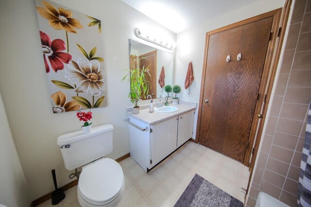 2607 King James Way, Fitchburg, WI 53719 - bathroom with tile patterned floors, vanity, and toilet
