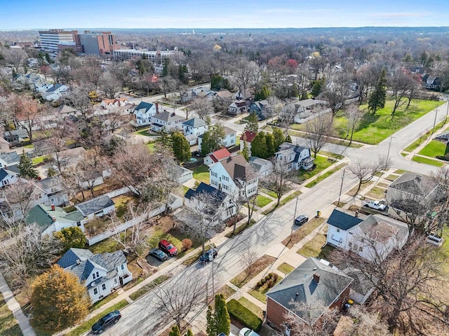 birds eye view of property with a residential view