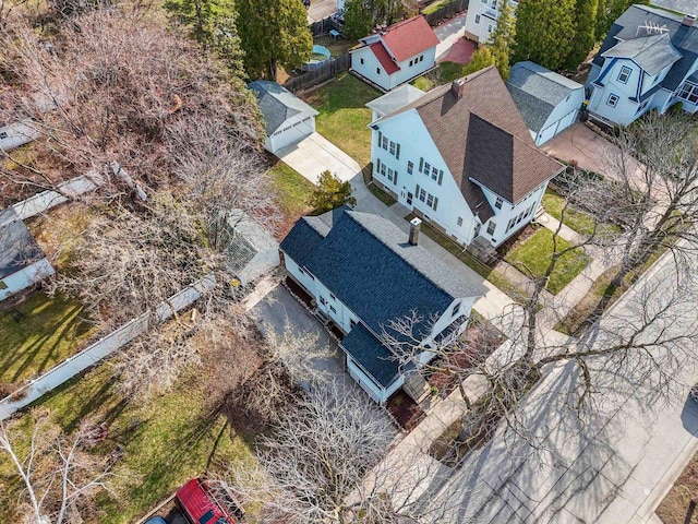 birds eye view of property with a residential view