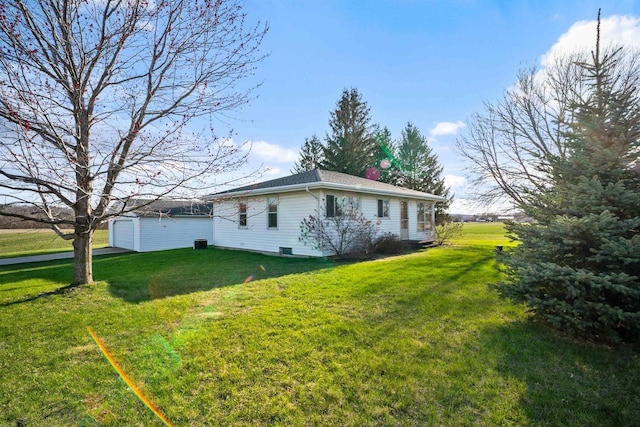 W14390 State Road 23-49, Ripon, WI 54971 - view of home's exterior with a garage and a yard