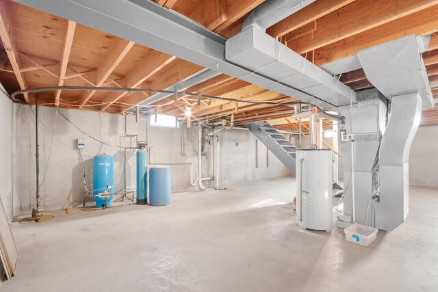 W14390 State Road 23-49, Ripon, WI 54971 - below grade area with stairway, water heater, and heating unit