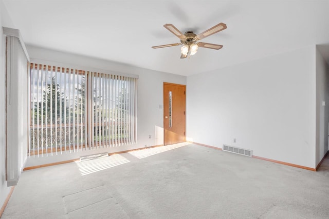 W14390 State Road 23-49, Ripon, WI 54971 - carpeted empty room with baseboards, a ceiling fan, and visible vents