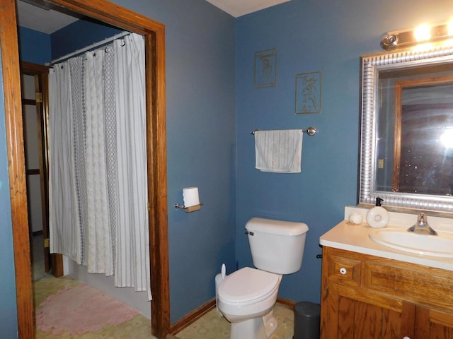 N17W5247 Garfield Cir Unit N17W5249, Cedarburg, WI 53012 - bathroom featuring toilet, a shower with curtain, vanity, and baseboards