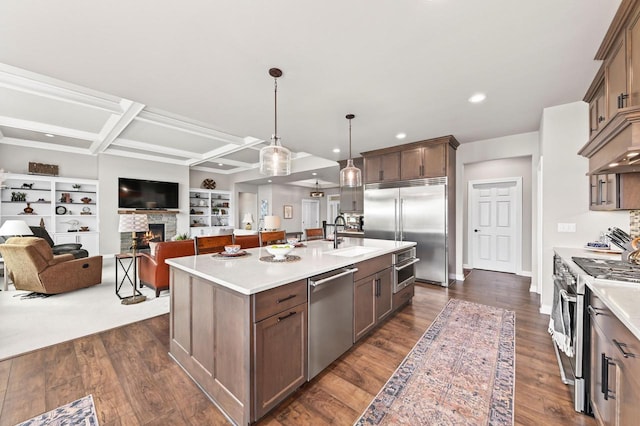 N56W27213 Crispin Ct, Lisbon, WI 53089 - kitchen with open floor plan, light countertops, high quality appliances, and a sink