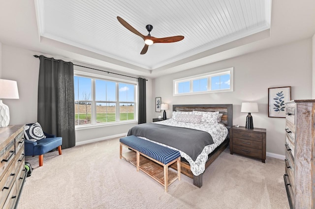 N56W27213 Crispin Ct, Lisbon, WI 53089 - bedroom featuring light colored carpet, baseboards, a ceiling fan, and a tray ceiling