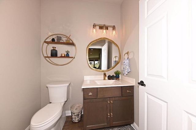N56W27213 Crispin Ct, Lisbon, WI 53089 - bathroom featuring baseboards, toilet, and vanity