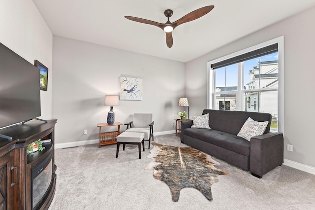 N56W27213 Crispin Ct, Lisbon, WI 53089 - carpeted living area with a ceiling fan and baseboards