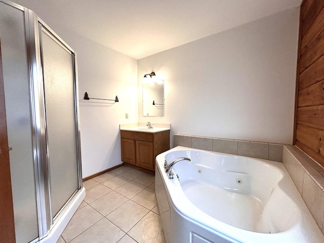 319 Hilltop Ct, Warrens, Warrens, WI 54666 - full bathroom with vanity, tile patterned flooring, a shower stall, and a tub with jets