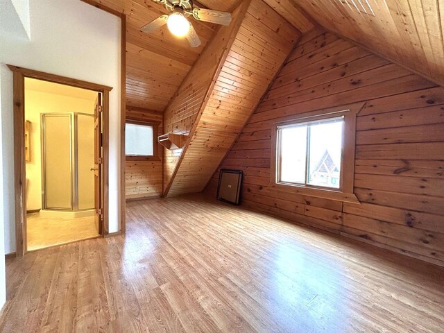 319 Hilltop Ct, Warrens, Warrens, WI 54666 - additional living space with a ceiling fan, wood walls, wood finished floors, wood ceiling, and lofted ceiling