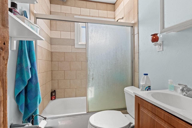 303 N Ashland Ave, Green Bay, WI 54303 - bathroom featuring toilet, vanity, and combined bath / shower with glass door