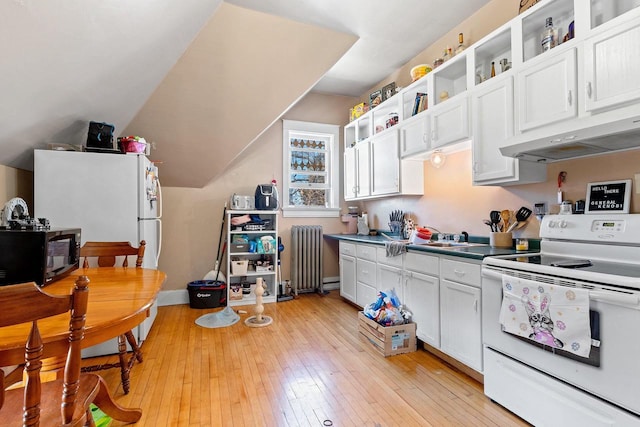 303 N Ashland Ave, Green Bay, WI 54303 - kitchen with radiator heating unit, open shelves, light wood-style floors, white appliances, and under cabinet range hood