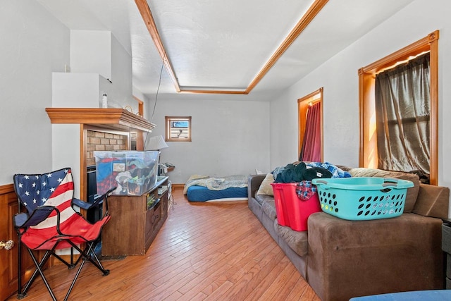 303 N Ashland Ave, Green Bay, WI 54303 - interior space featuring wood-type flooring and a fireplace