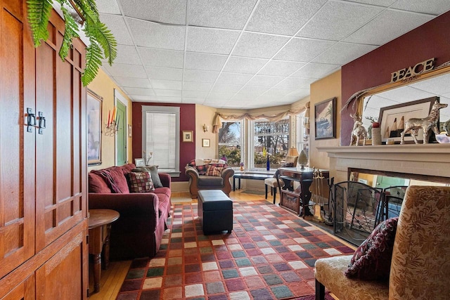 303 N Ashland Ave, Green Bay, WI 54303 - living area featuring a fireplace and a drop ceiling