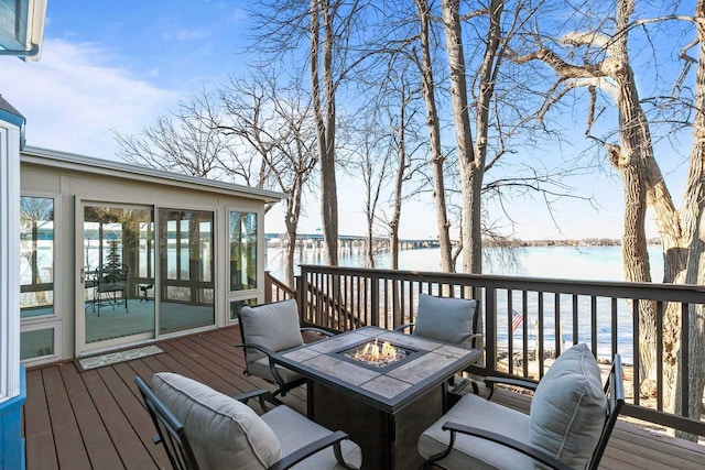 1096 Lakeshore Dr, Menasha, WI 54952 - wooden deck with a water view and an outdoor fire pit