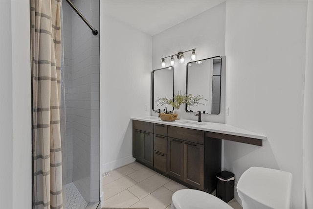 bathroom featuring a sink, a stall shower, tile patterned floors, and toilet