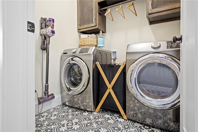 3426 Creek Ridge Dr, Eau Claire, WI 54703 - laundry room featuring washing machine and clothes dryer and cabinet space