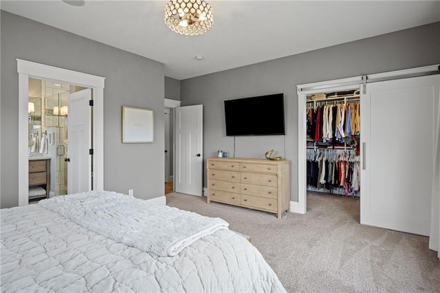 3426 Creek Ridge Dr, Eau Claire, WI 54703 - bedroom featuring a chandelier, a closet, carpet floors, and a spacious closet