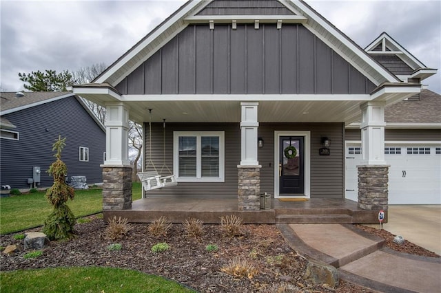 3426 Creek Ridge Dr, Eau Claire, WI 54703 - craftsman-style house featuring concrete driveway, an attached garage, a porch, and board and batten siding